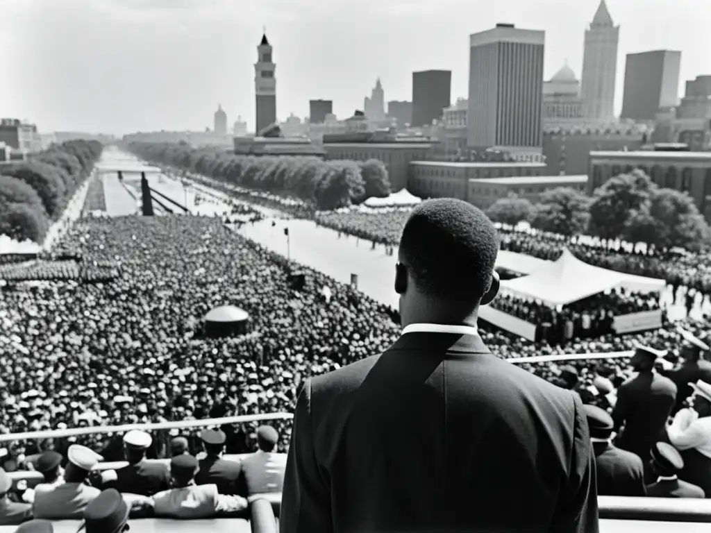 Malcolm X: Líder carismático de la Nación del Islam Imagen en blanco y negro de Malcolm X liderando a la Nación del Islam, con carisma y pasión, rodeado de seguidores determinados